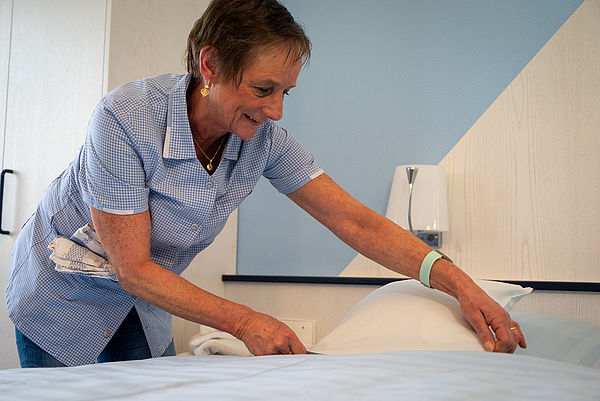 Our Housekeeping is inspecting a hotel room